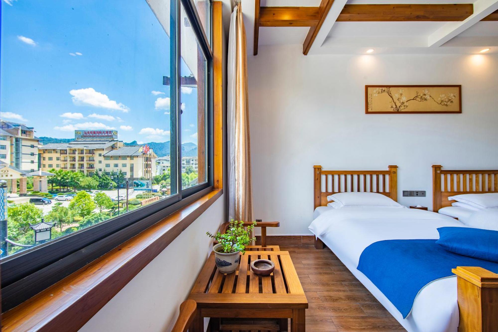 Guihua Road 106Th Hostel Zhangjiajie Exteriör bild