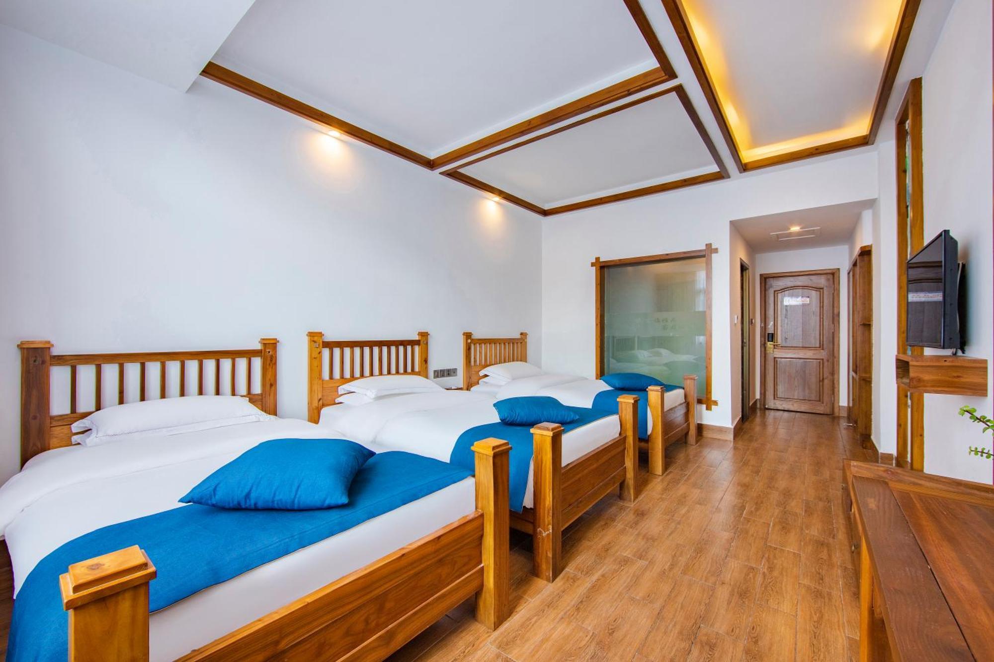 Guihua Road 106Th Hostel Zhangjiajie Rum bild