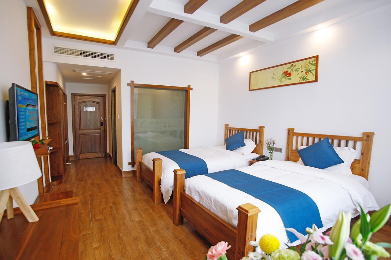 Guihua Road 106Th Hostel Zhangjiajie Exteriör bild